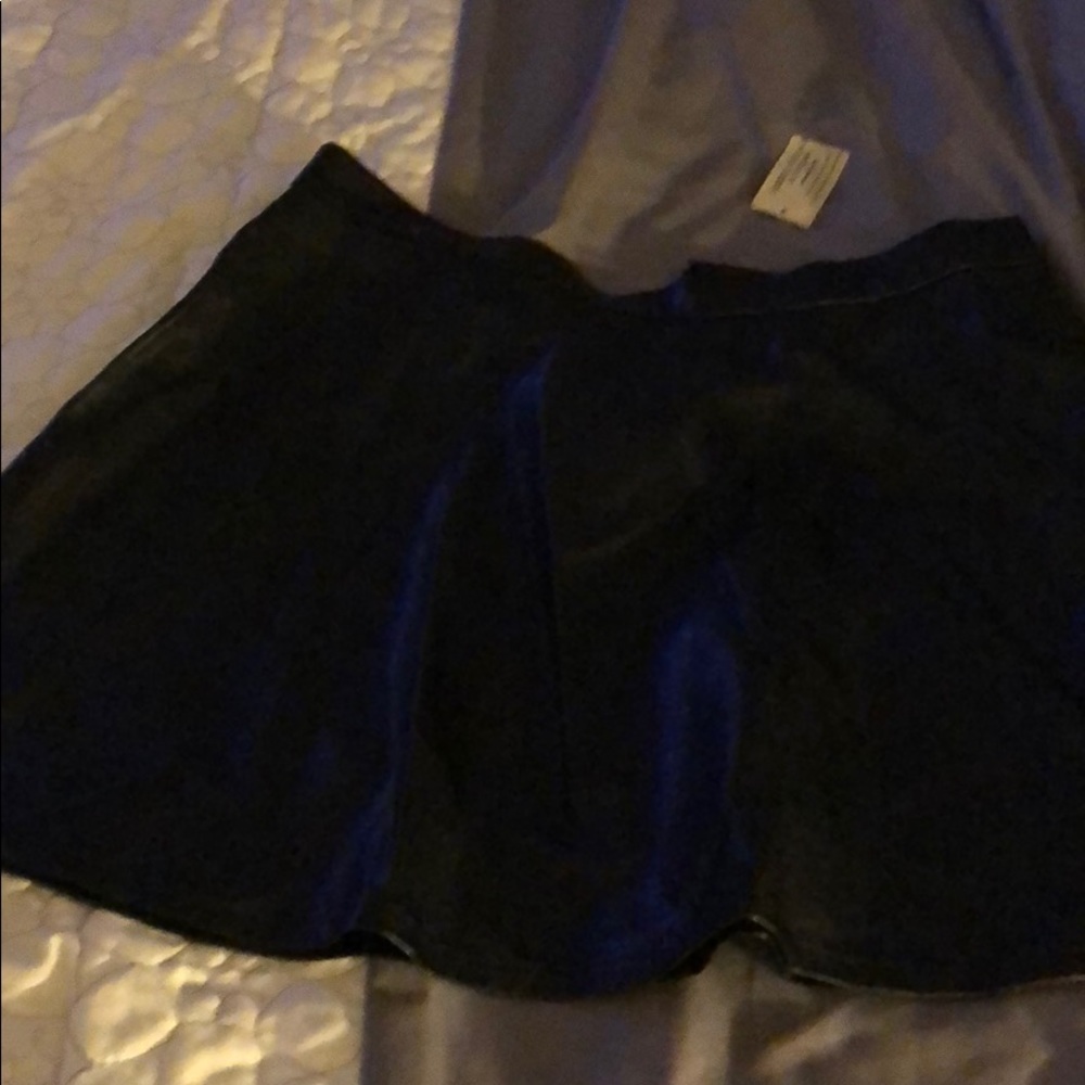 Black leather skirt with tags